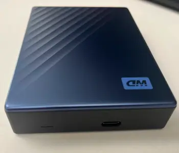 An image of a 6 TB WD MyPassport Ultra on a table. 