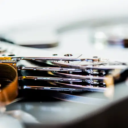 Read/write heads resting in the parking ramp of a hard disk.