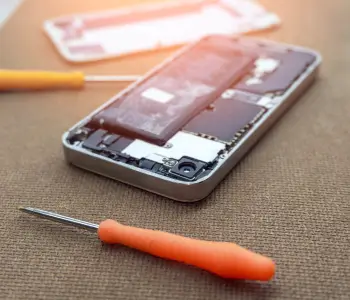 A view of internal components from a phone with water damage.