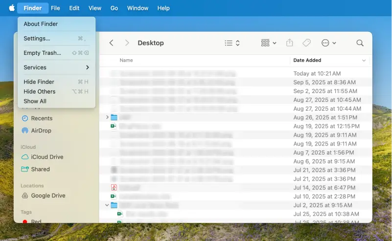 A screenshot showing the location of the Settings menu in Finder on macOS.