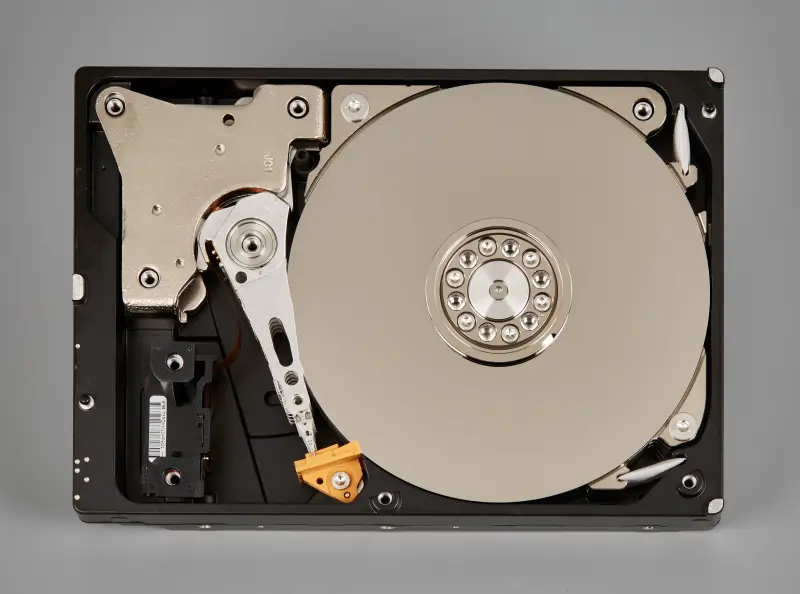 An overhead view of a hard disk drive removed from its housing.