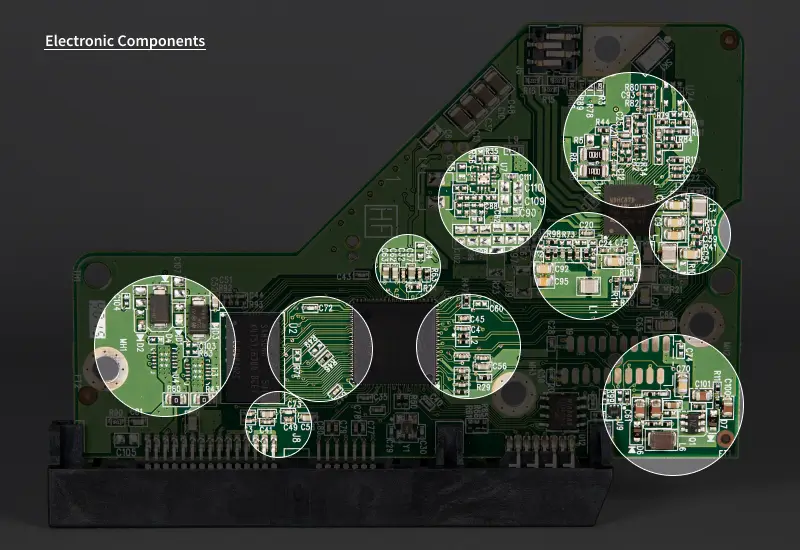 An image highlighting many electronic components on a hard drive’s PCB.