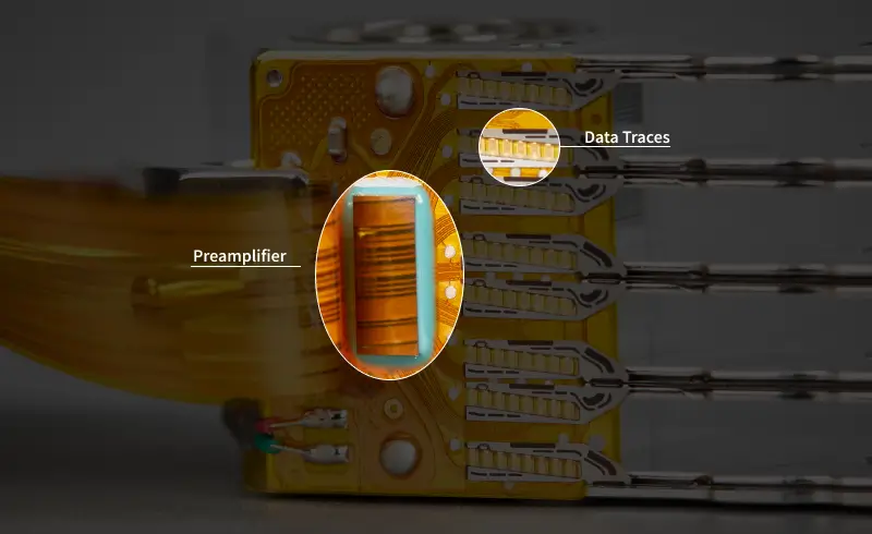 An image highlighting the preamplifier inside the head assembly of a hard drive.