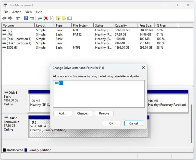 A screenshot showing how to change a drive letter in Disk Management on Windows.