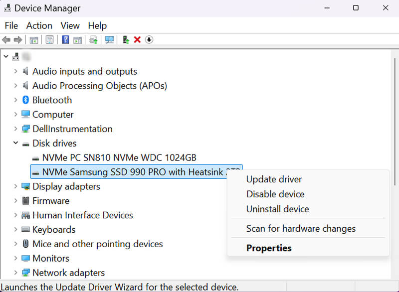 A screenshot showing how to update drivers on SSD drivers in Device Manager.